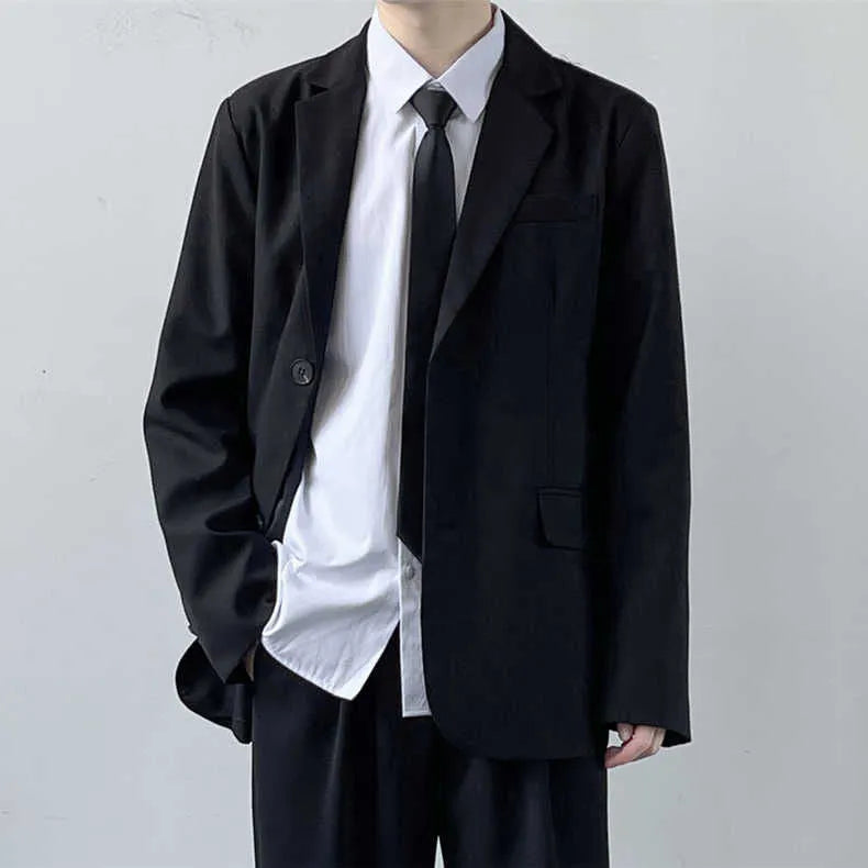 Plus size men's loose fit college style suit set with trousers, white shirt, and tie on a hanger.