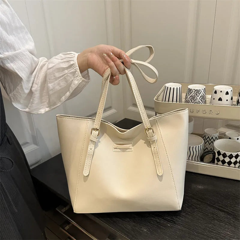Large capacity women's retro PU shoulder bag in black with double connector straps and three-dimensional outer pocket