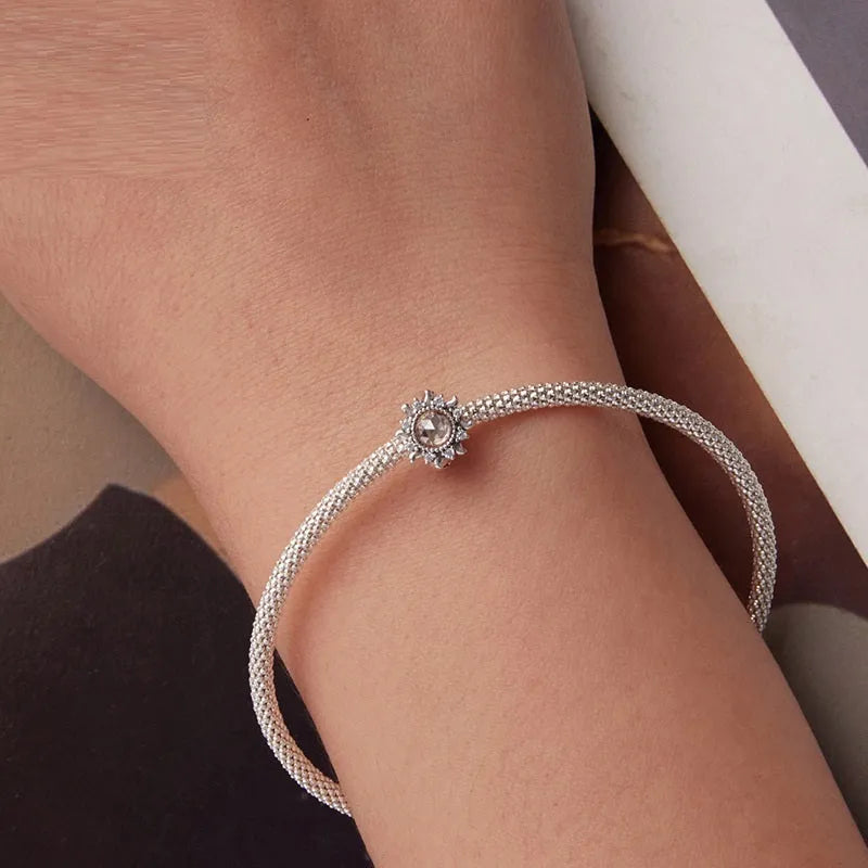 S925 sterling silver sunflower silicone positioning spacer bead on white background, 0.9cm size, SCC3163