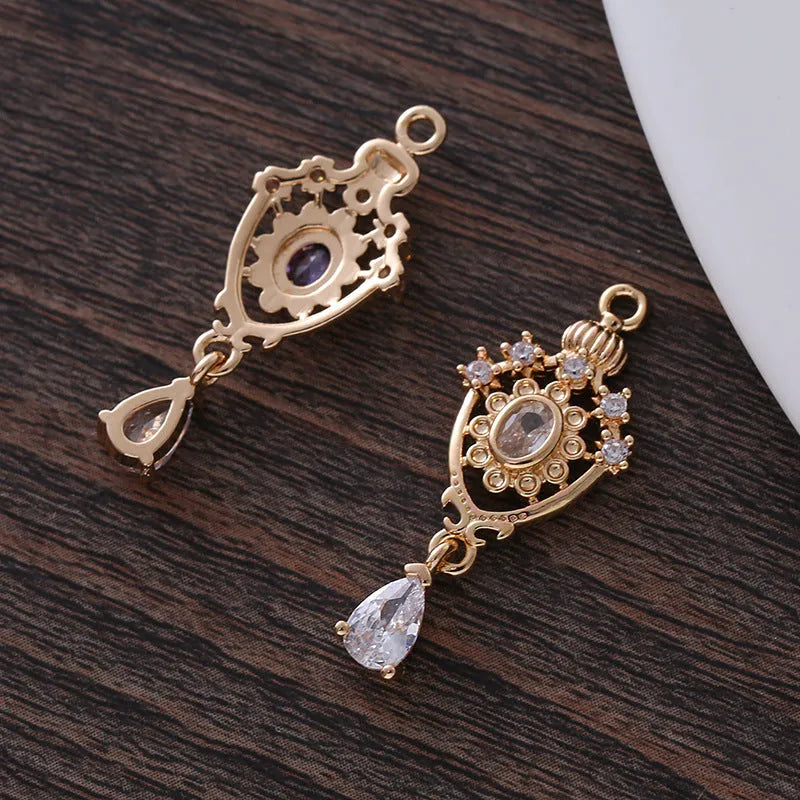 Water drop-shaped pendant with hollow crown design and micro zircon details in five colour options