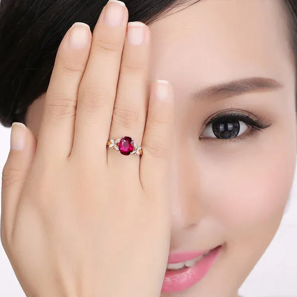Women's copper butterfly ring with heart shape design in red and blue colour options