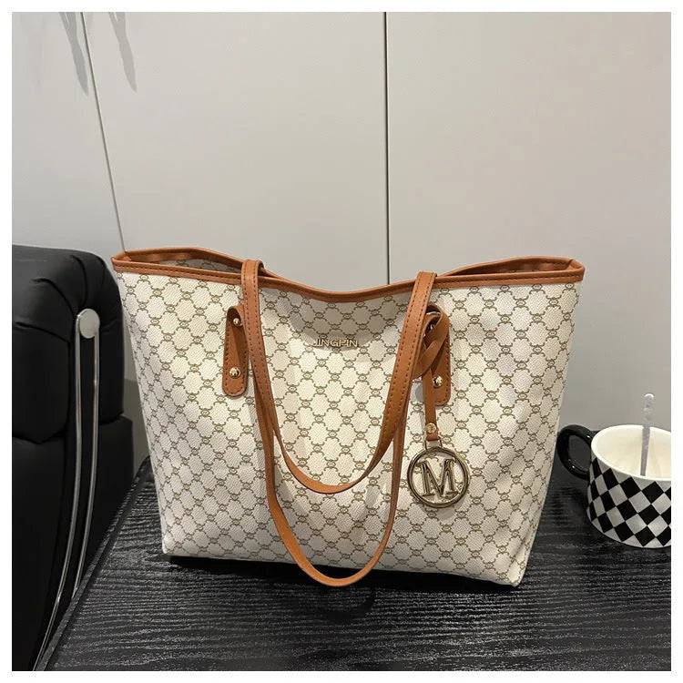 PU leather shoulder bag with adjustable strap in street trend style showing black colour option