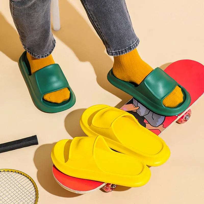 Thick-soled EVA flip flop slippers in multiple colours on a white background.