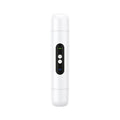 Pink and white portable electric body hair trimmer with USB cable on a white background