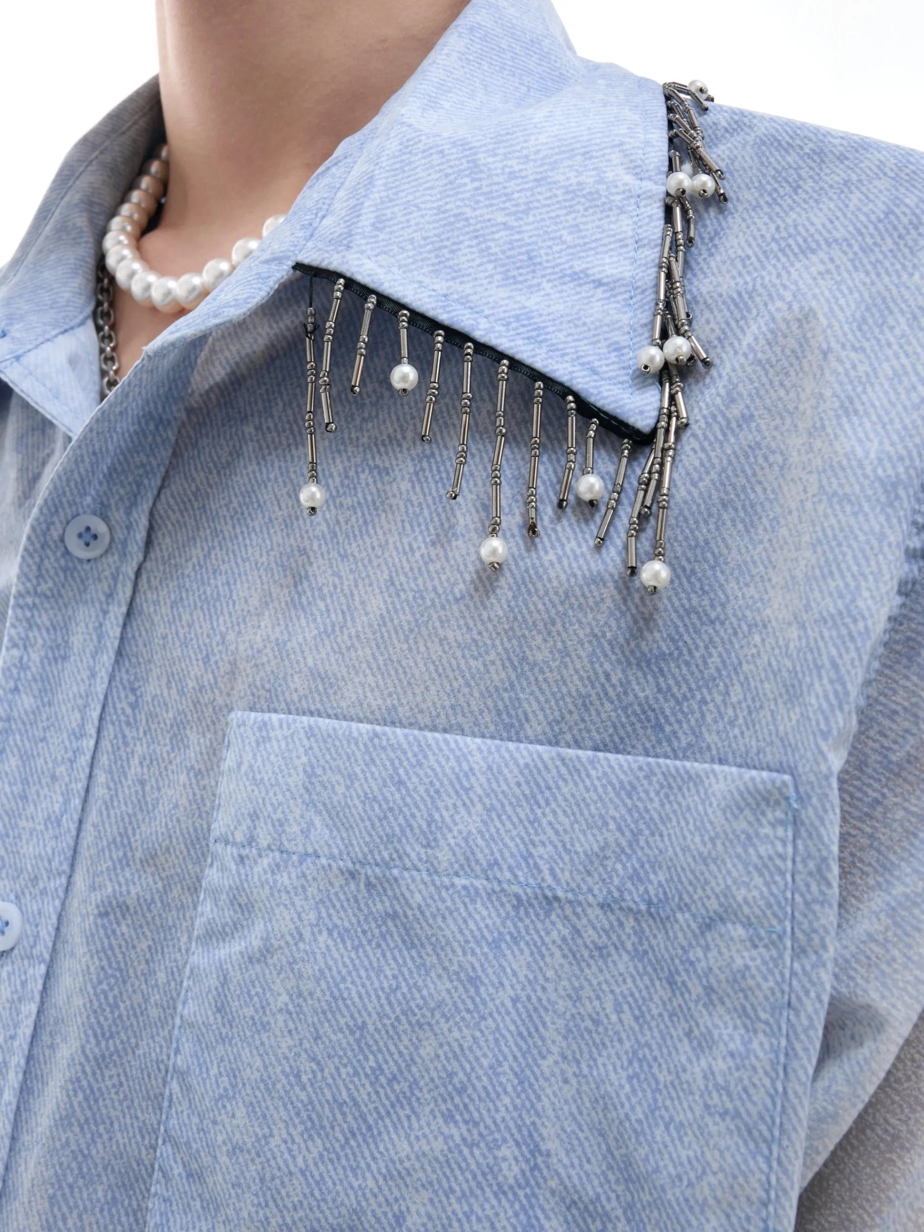Blue and white gradient loose fit short sleeve casual shirt on a hanger.