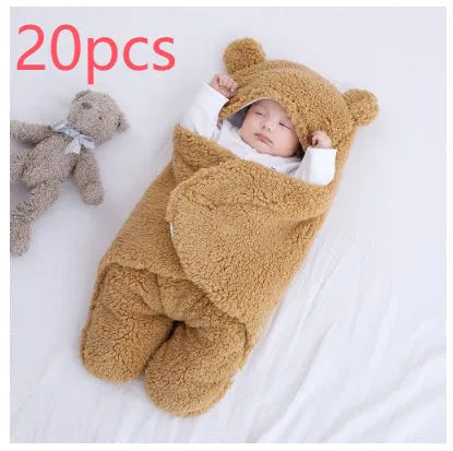 Cotton blend baby quilted sleeping bag wrapper shown in light blue, with size and colour options displayed.
