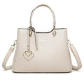 Women's multi-layer shoulder messenger bag in PU material showing compartment design