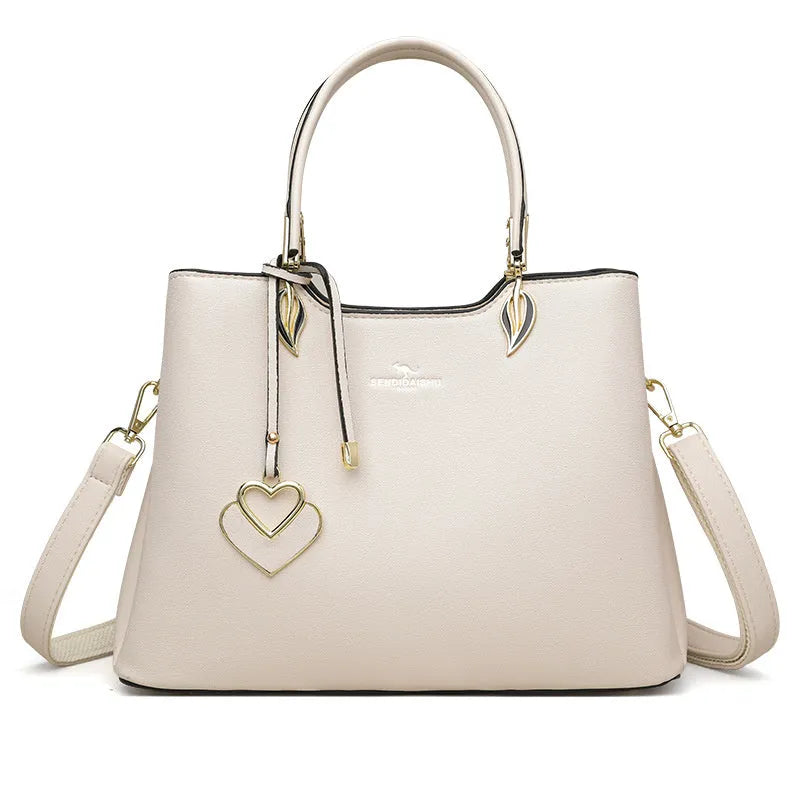 Women's multi-layer shoulder messenger bag in PU material showing compartment design