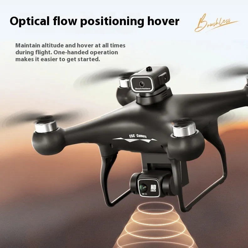 Black S116 drone with four propellers, obstacle sensors visible on its sides, next to its remote control transmitter.
