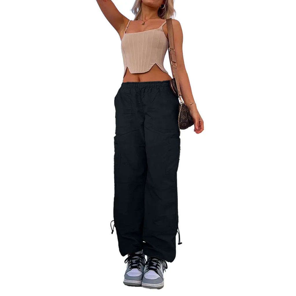 Man's loose-fit straight-leg cargo pants in polyester, shown in a choice of colours including khaki and grey.