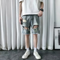 Men's thin ripped denim shorts in retro colour with handmade distressing, Bermuda length, size L