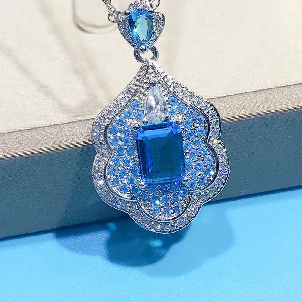 Sea blue geometric copper pendant with aquamarine topaz mirror finish