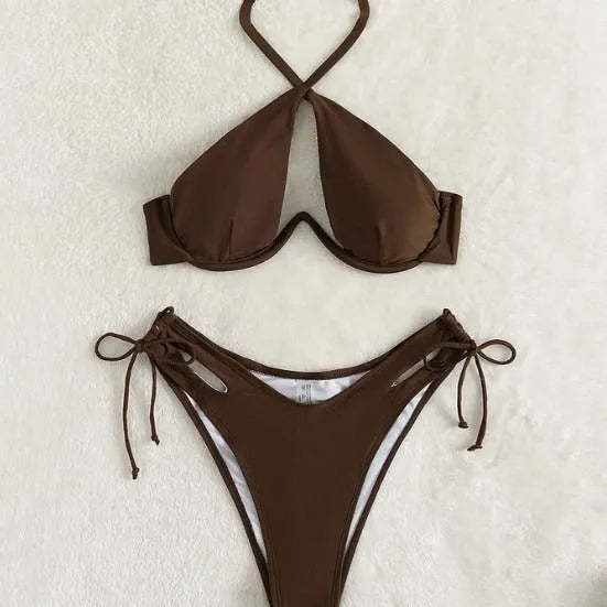 Women's brown halter neck bikini set with brief bottoms on a mannequin.