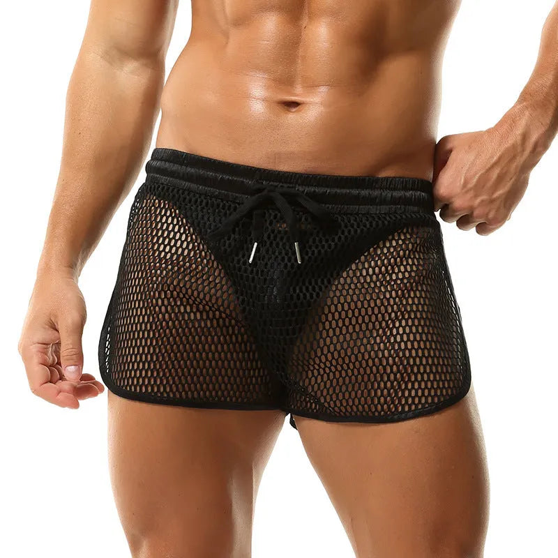 Men's solid colour loose boxer shorts in black, white, gray, or red on a size chart