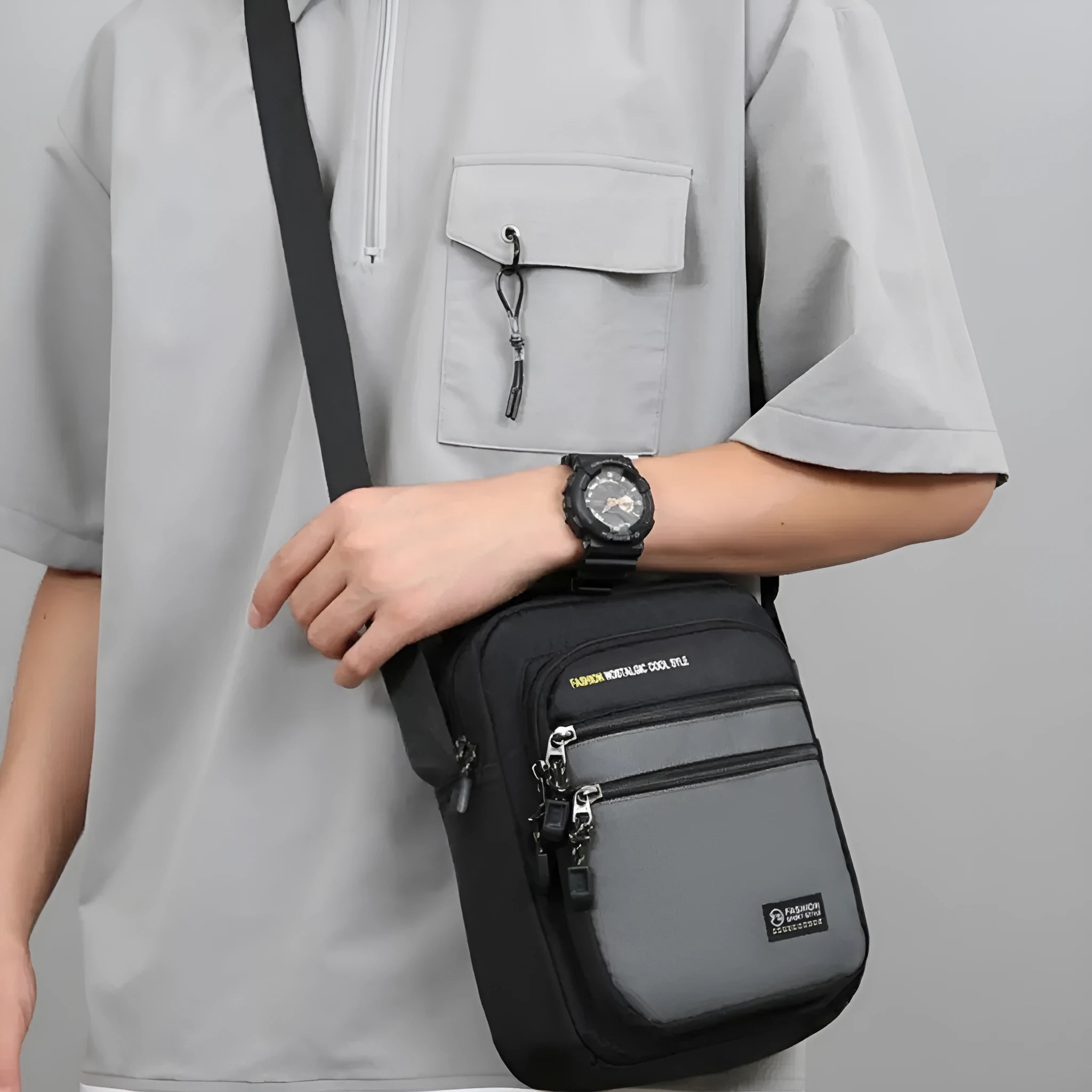 Men's nylon crossbody bag in a solid colour with a shoulder strap, showing urban simplicity style.