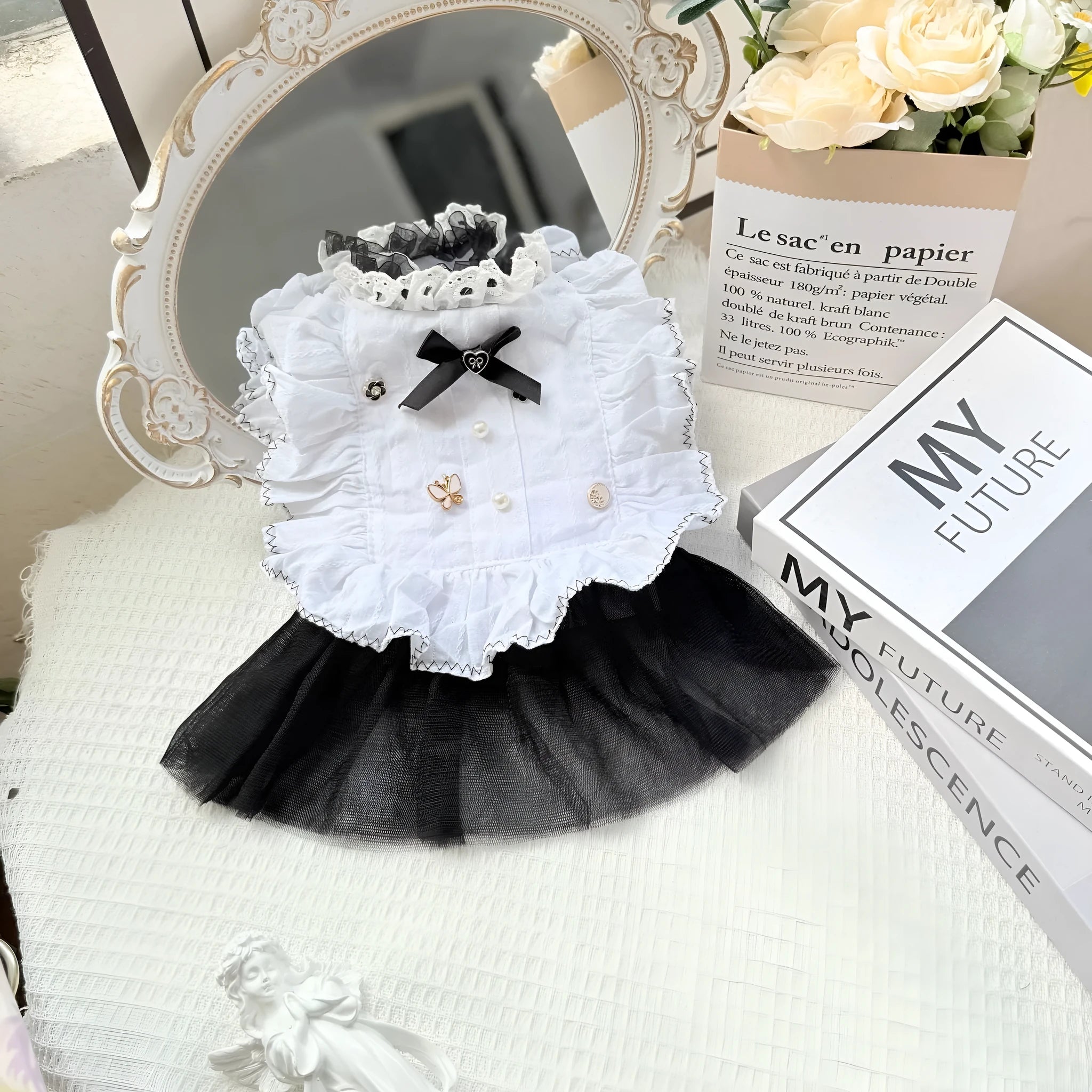 White yarn-textured gauze skirt for a small dog, shown in a princess-style fit on a pet.
