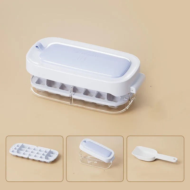 Yellow high-capacity grid ice cube tray with integrated storage slot for an ice shovel
