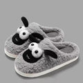 Brown lamb thermal cotton slip-on slippers with a stitched PVC sole on a wooden floor.