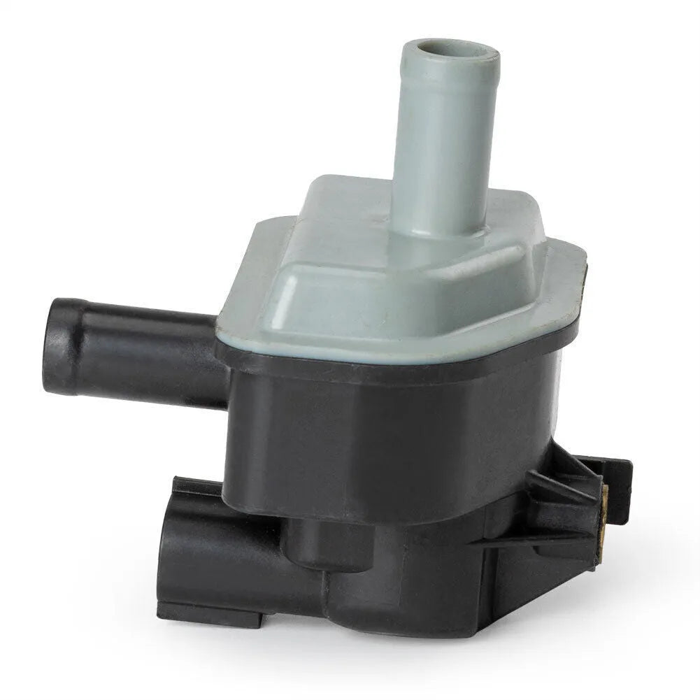 Black Toyota vacuum solenoid valve with model number 90910-12283 visible
