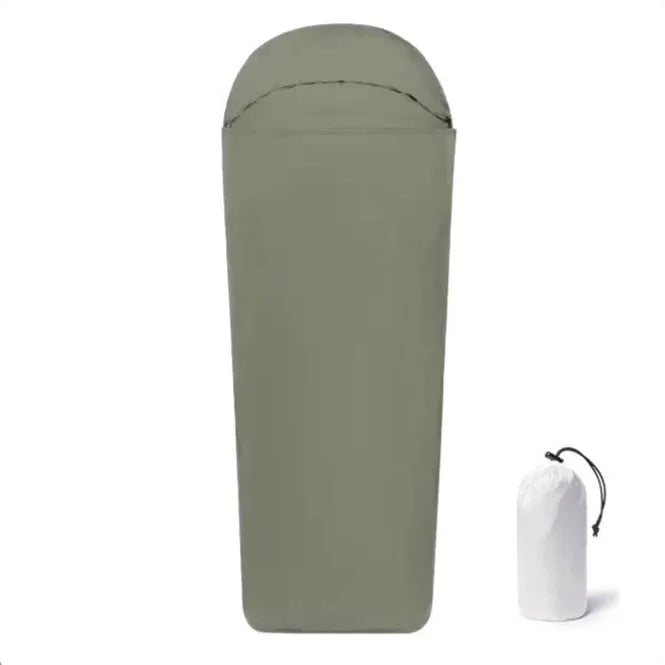 Blue mummy-style nylon sleeping bag unrolled, showing tapered design and matt fabric texture.