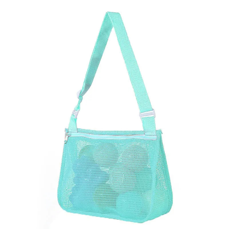 Blue nylon mesh travel storage bag with black handle and zip seal for children's clothing organisation