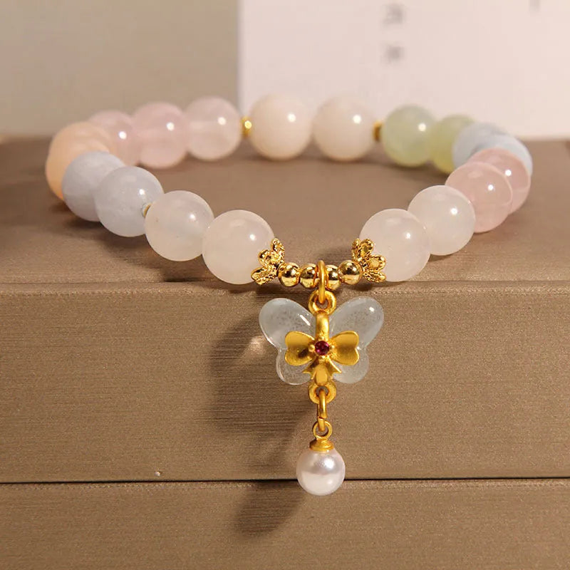 Women's bracelet with colourful Morganite butterfly pendant and crystal links.