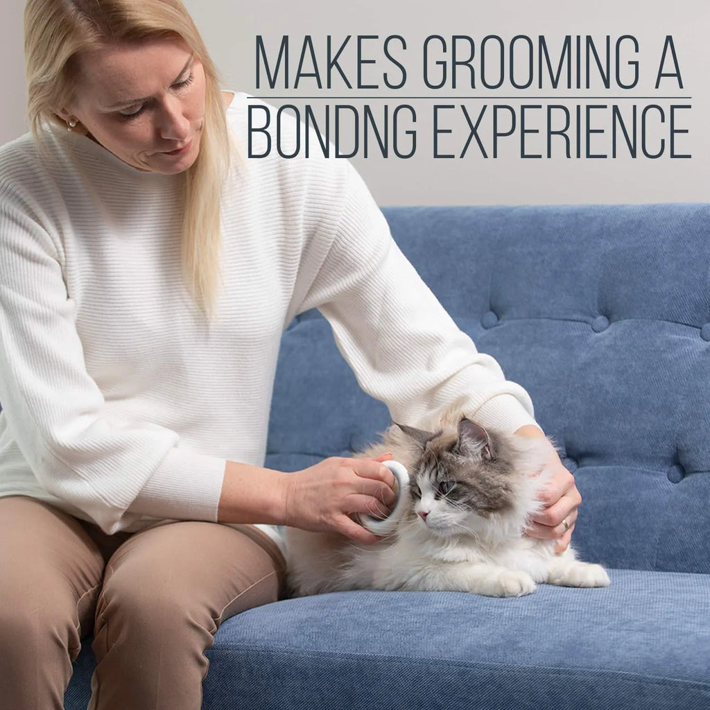 Blue pet deshedding comb with soft teeth and ergonomic handle for cats and dogs.