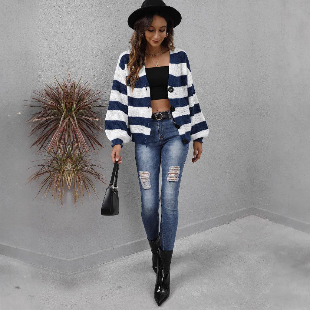 Blue striped women's cardigan with button front and regular sleeves made from deer plush fabric.