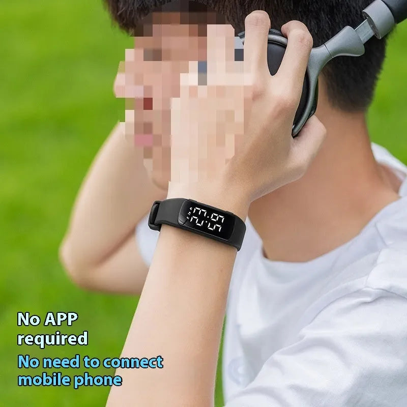 Smart electronic watch with LED display showing time, featuring vibration alarm and 50 metre waterproof rating with silicone strap