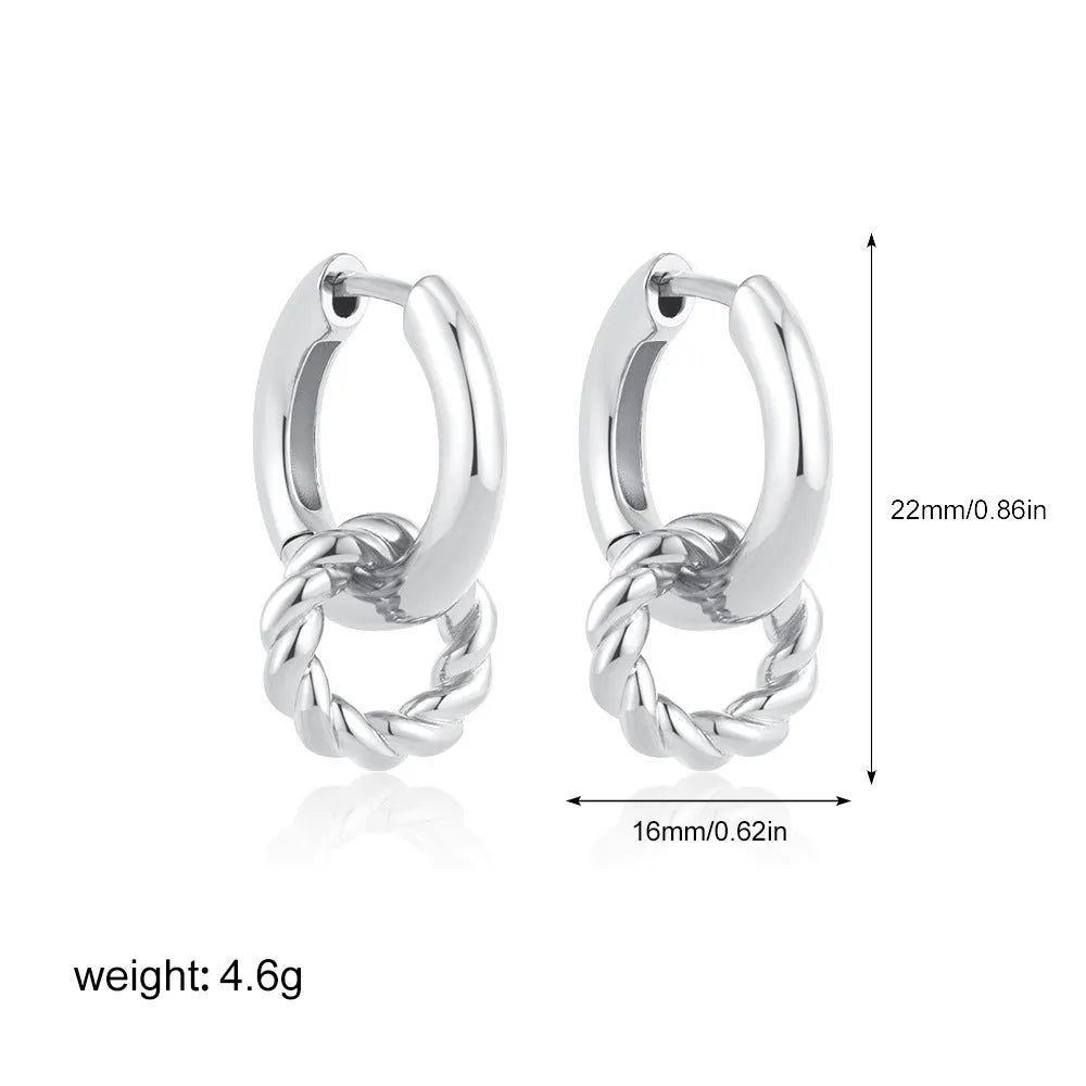 Copper geometric square double ring twist ear clip earrings on display