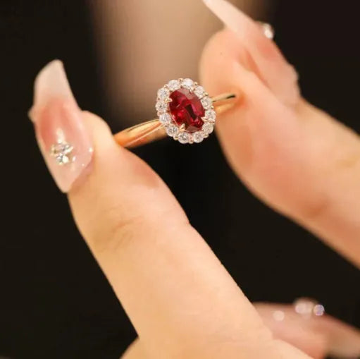 Gold pigeon motif women's ring with red blood ruby artificial gemstone and floral design in silver and gold plating