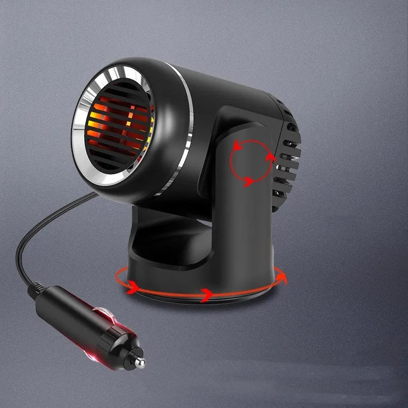Black and white 12V car heater defroster unit with a long power cord on a car dashboard.
