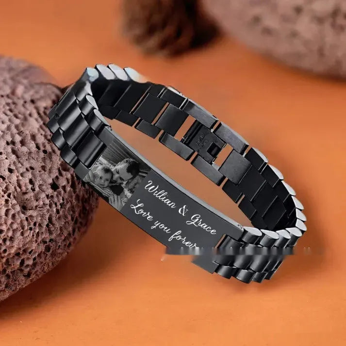 Men's stainless steel bracelet with curved heart design and black lettering in gift box