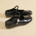 Women's casual shallow mouth round toe sandals with PU upper and rubber sole in black and silver