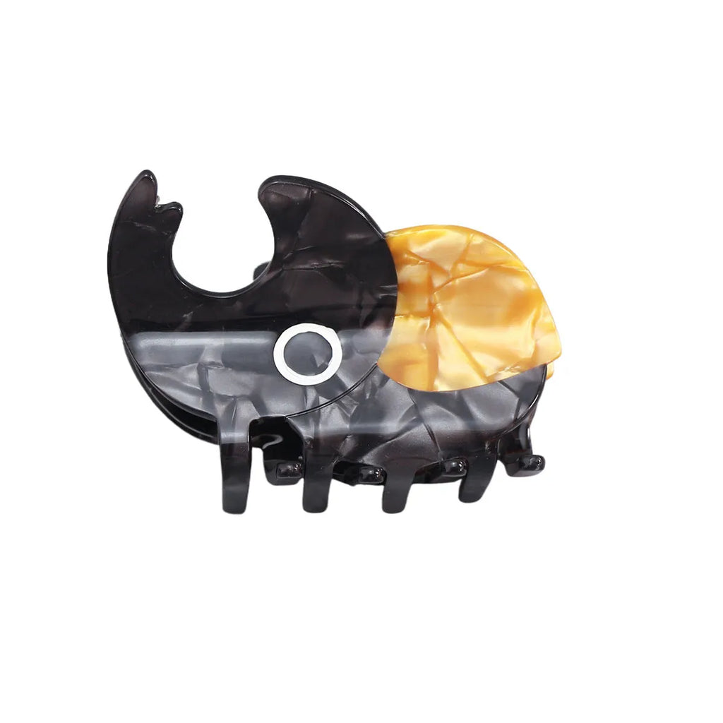 Handmade cellulose acetate beetle hair grip with cartoon caterpillar design in green, orange, or white colour options