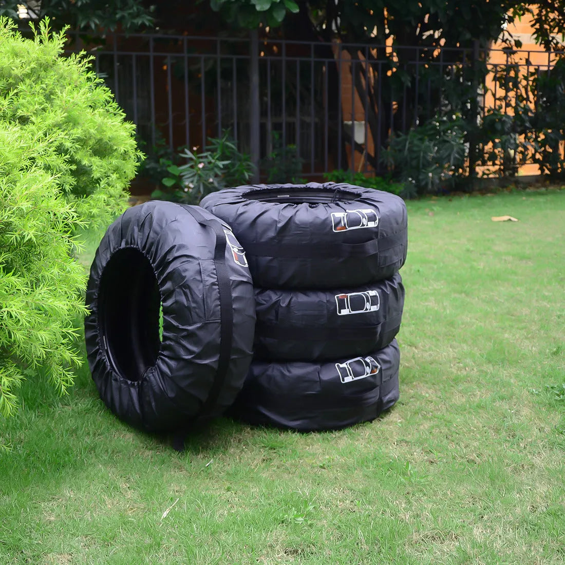 Oxford cloth 210D car tyre protective cover set of 4 in black belt style on a parked car