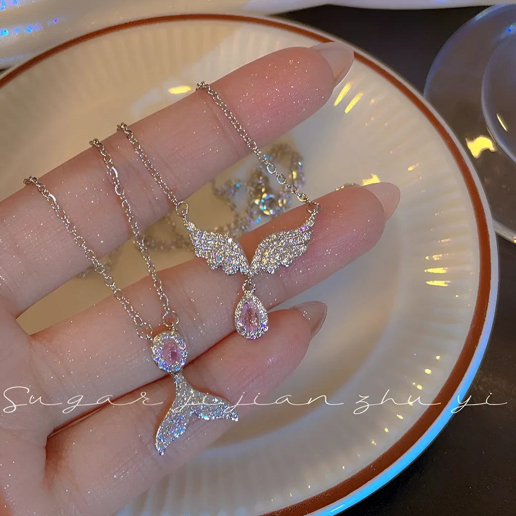 Women's S925 sterling silver adjustable necklace with choice of angel wing or fishtail pendant on O-ring chain