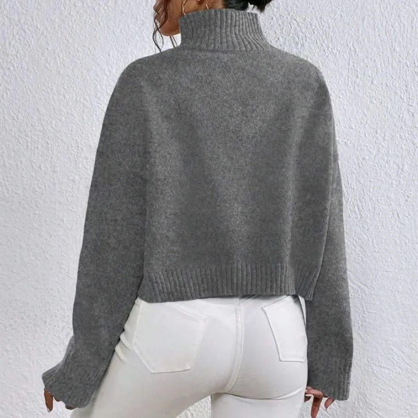 Loose versatile basic women's pullover in gray, showing thread texture and relaxed fit