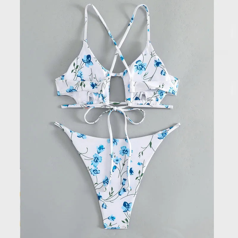 Women's floral pattern swimsuit with tie-neck triangle top and matching shorts