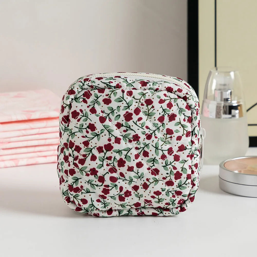 Floral pattern key storage bag made from breathable polyester fabric in various colour options.