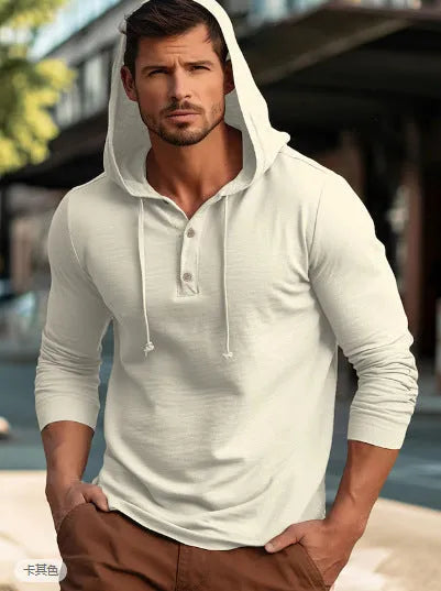A dark blue cotton pullover hoodie with long sleeves on a hanger.