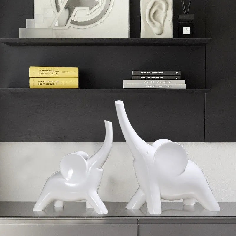Modern minimalist resin elephant ornament in rose gold or white colour, available in large and small sizes.