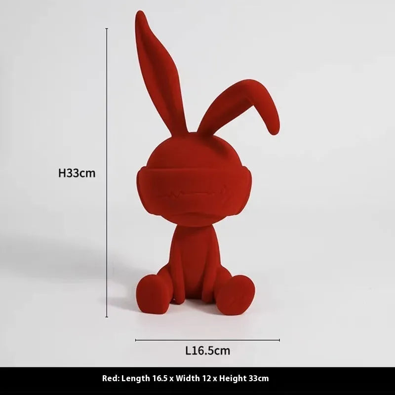 Suede blindfold rabbit resin table ornament in choice of blue, green, or red colours.