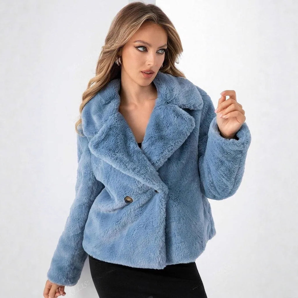 A women's rose red loose-fit short faux fur coat with regular sleeves on a hanger.