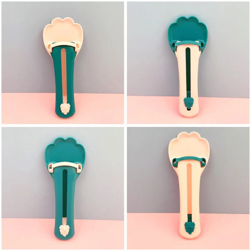 Pet feed spoon squeezer with food scoop design in green and pink two-tone colour options
