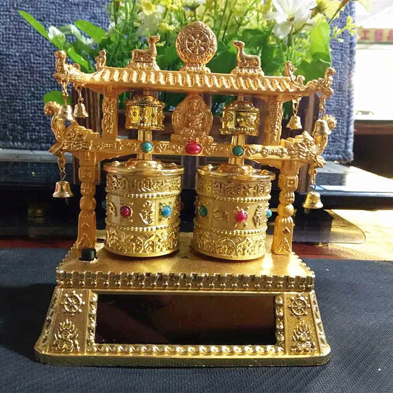 Traditional Chinese alloy prayer wheel car dashboard decoration measuring 12x15x8cm