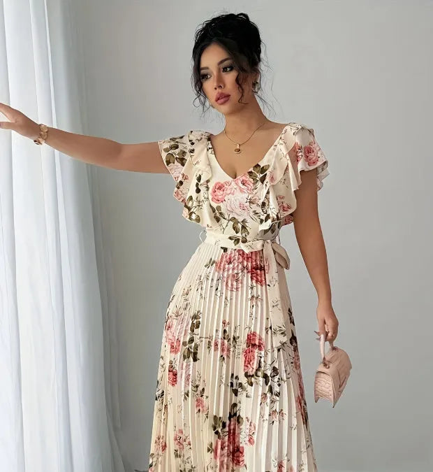 Apricot v-neck dress with digital floral print, ruffled short sleeves, high waist, and oversized swing skirt