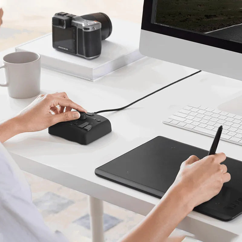 TourBox NEO USB auxiliary keyboard for video editing, measuring 198mm by 148mm.