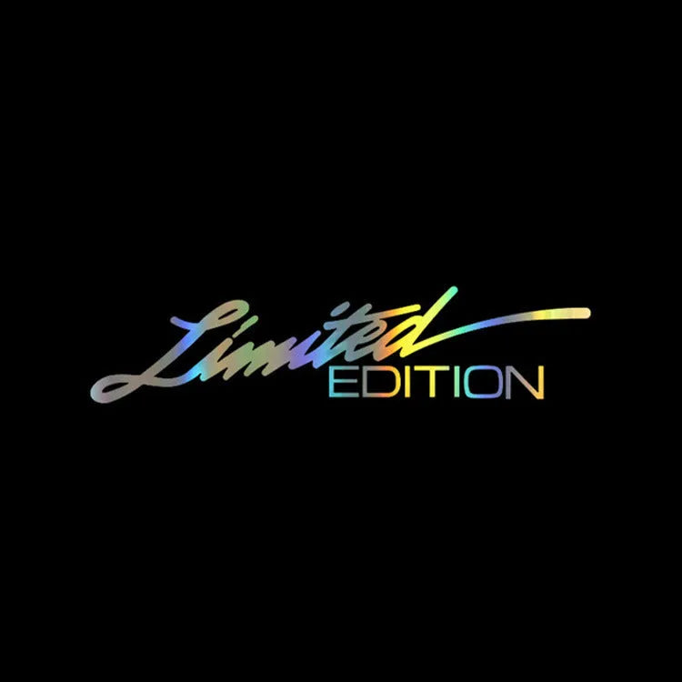 A black, white, and colourful British style reflective plastic bumper sticker, shown at its 16cm by 3.8cm size.