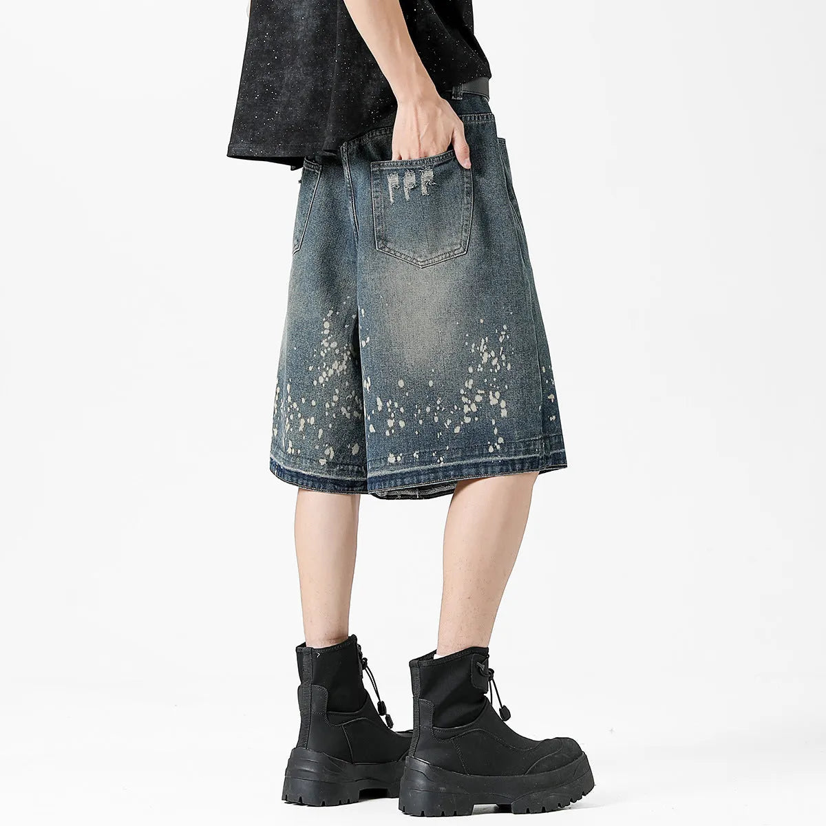 Men's retro blue denim shorts with ripped splash ink design, straight cut fifth-length
